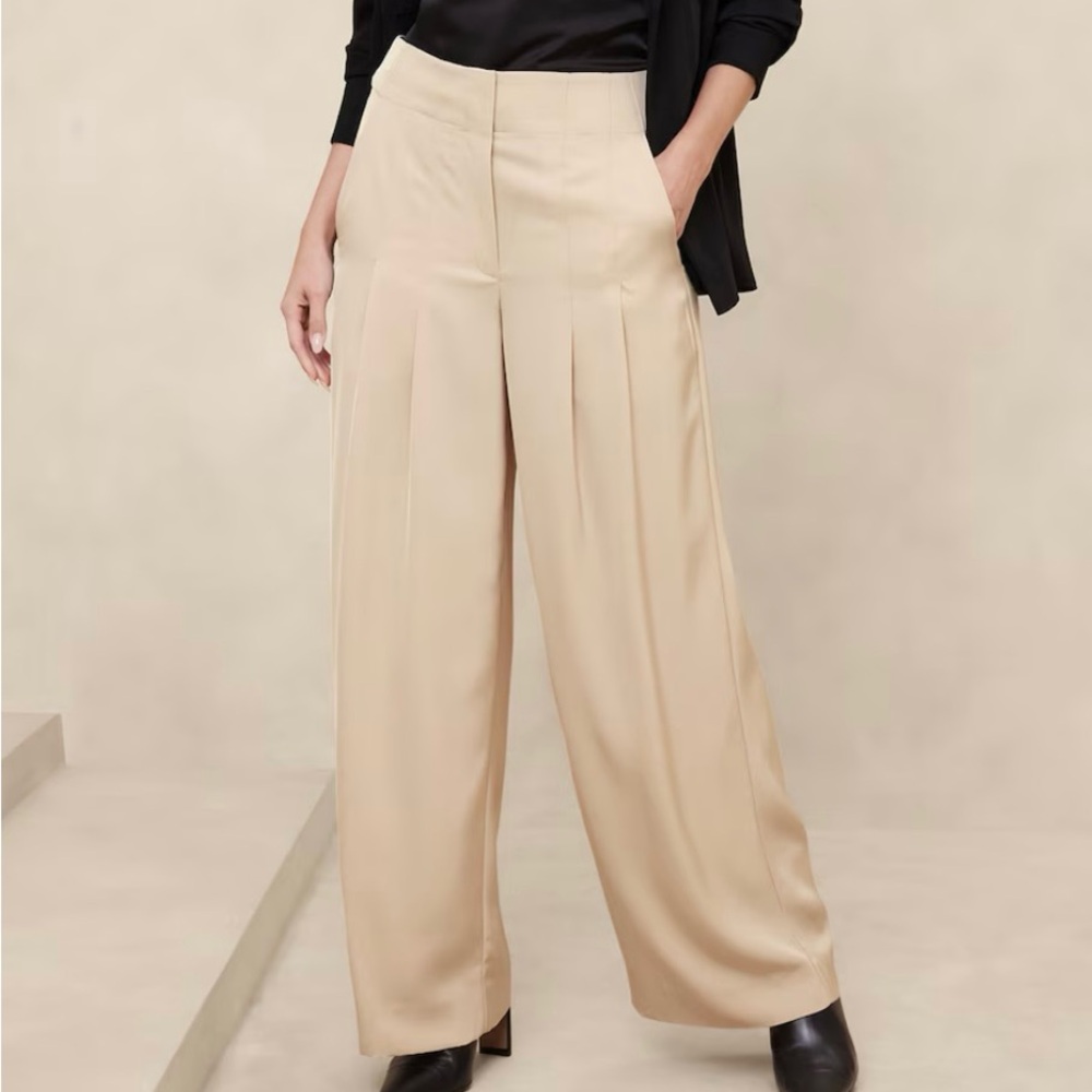 Elevate your look with our wide-leg pants that create a timeless silhouette.